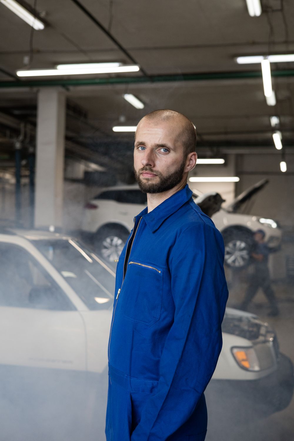 Priya Anand, owner and founder of Overdrive Auto Works, standing in the shop